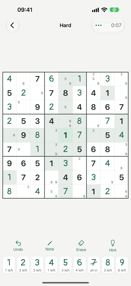 Kletka on iPhone: a sudoku grid on squared paper, the player's digits in green ink